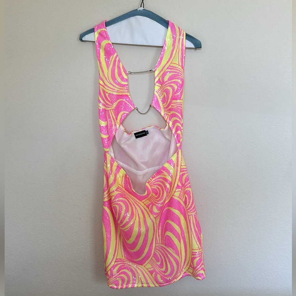 PrettyLittleThing Neon Pink & Yellow Swirl Backless Mini Dress with Chain Accent